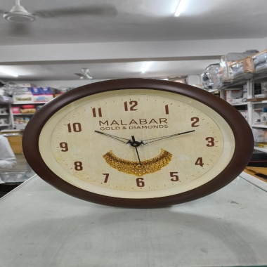Malabar Gold & Diamond wall clock