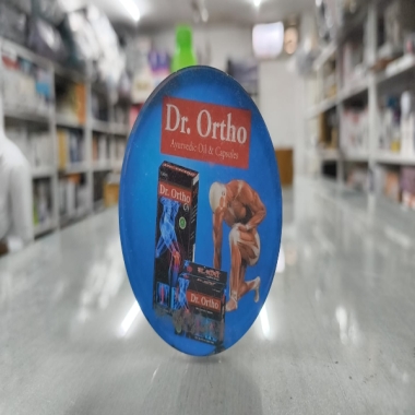 Plastic paper weight Dr. Ortho